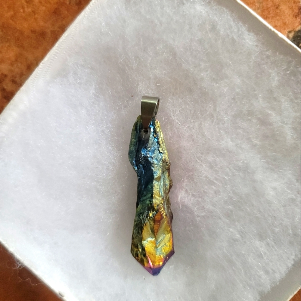 TITANIUM QUARTZ PENDANT  SYMBOLIC  OF POSITIVE ENERGY AND STRENTH